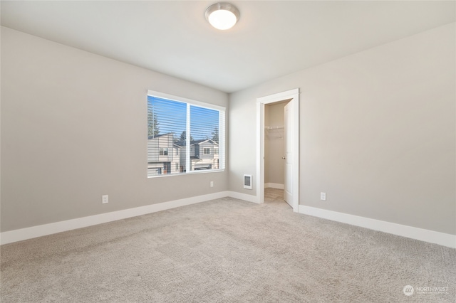 empty room with carpet flooring