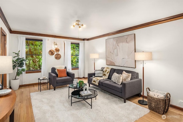 living room with light wood-type flooring and crown molding