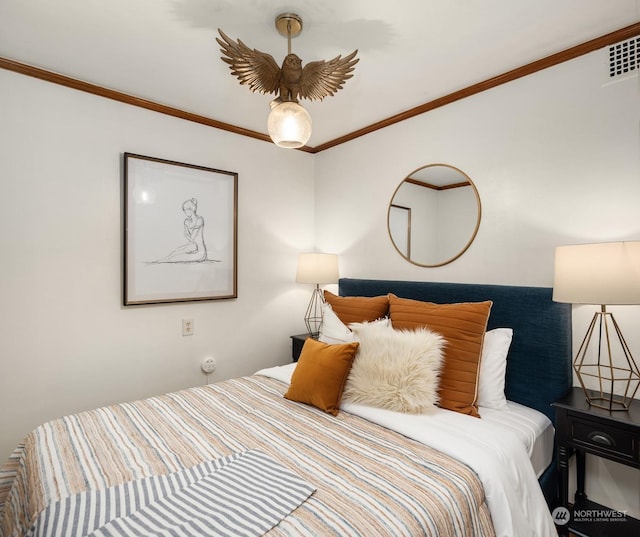 bedroom with ornamental molding