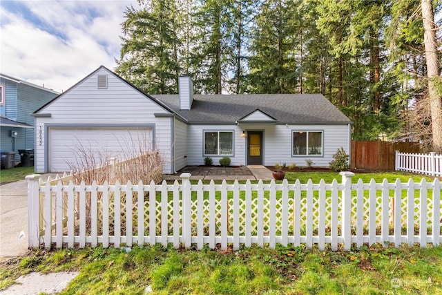 ranch-style home featuring a front lawn and a garage