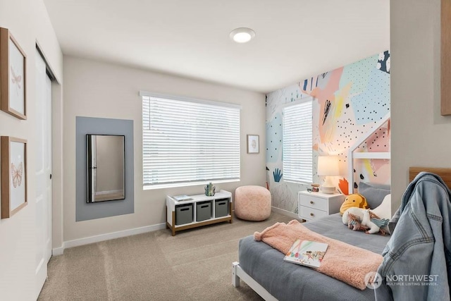 carpeted bedroom with multiple windows