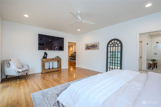 bedroom with ceiling fan and hardwood / wood-style floors