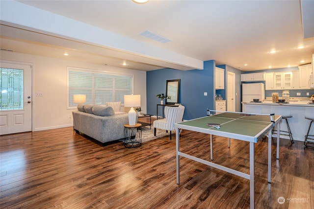 recreation room featuring dark hardwood / wood-style floors