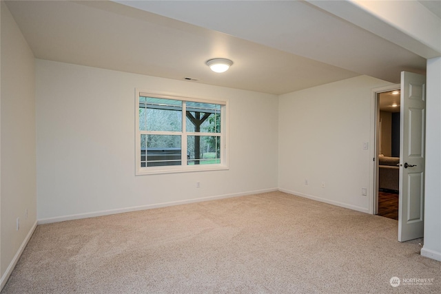 view of carpeted spare room