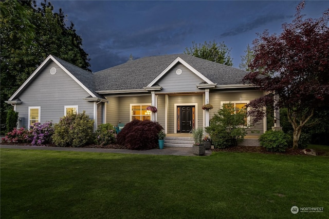 view of front of home featuring a yard