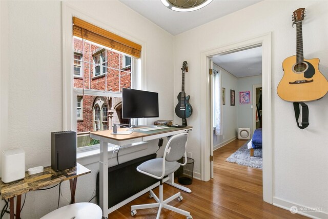 office space featuring hardwood / wood-style floors