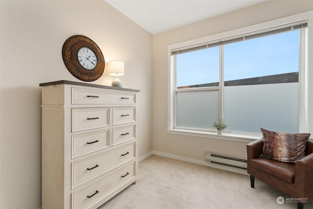 living area featuring lofted ceiling, light carpet, and a baseboard radiator