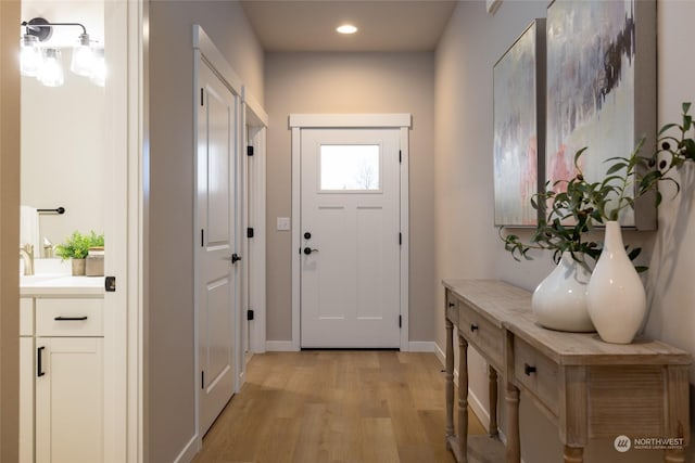 doorway featuring light wood-type flooring