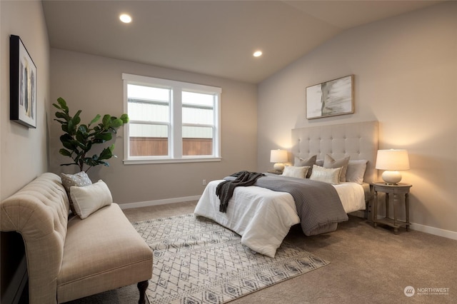 carpeted bedroom featuring vaulted ceiling