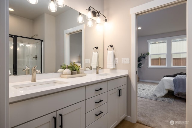 bathroom with vanity and an enclosed shower