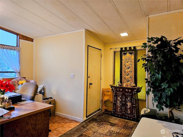 home office featuring a textured ceiling and crown molding