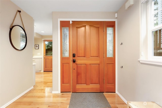 foyer entrance featuring light wood-type flooring