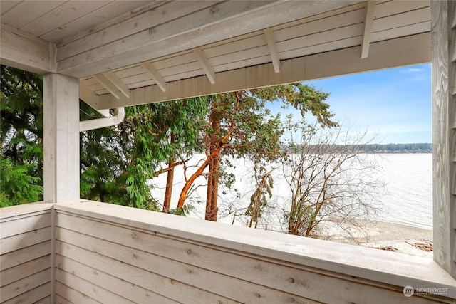 balcony featuring a water view