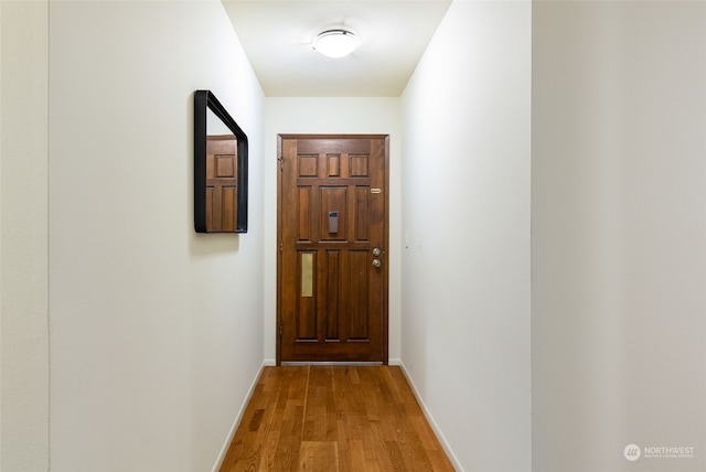 doorway featuring light hardwood / wood-style floors