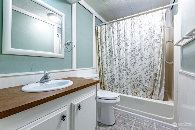 full bathroom featuring shower / tub combo, tile patterned floors, vanity, a textured ceiling, and toilet