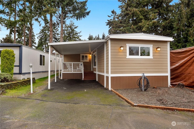 manufactured / mobile home with a carport