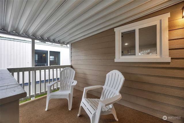 view of patio with a balcony