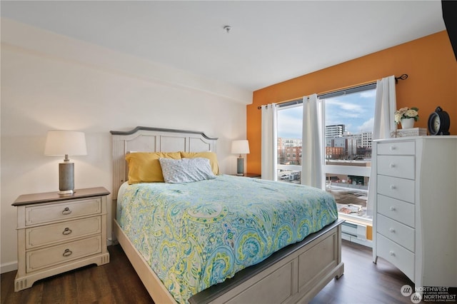 bedroom featuring dark hardwood / wood-style floors