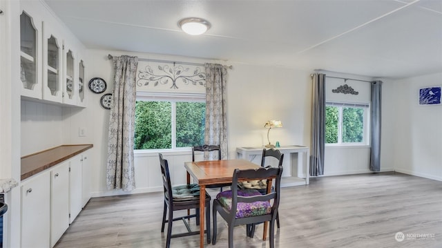 dining space featuring light hardwood / wood-style floors