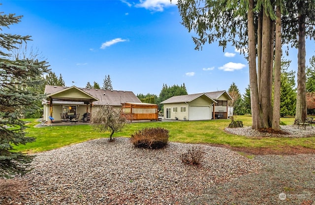 view of yard with a garage