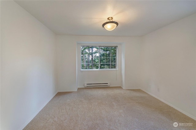 unfurnished room with light carpet and a baseboard radiator