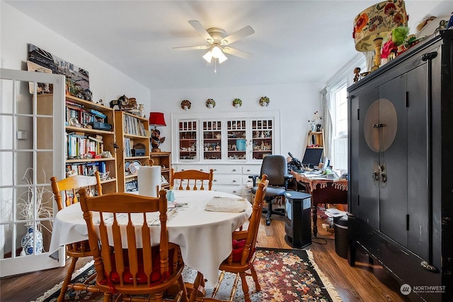 dining space featuring hardwood / wood-style flooring and ceiling fan