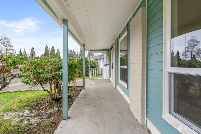 view of patio featuring a porch