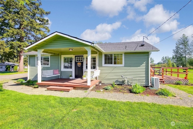 view of front of home featuring a front lawn and covered porch