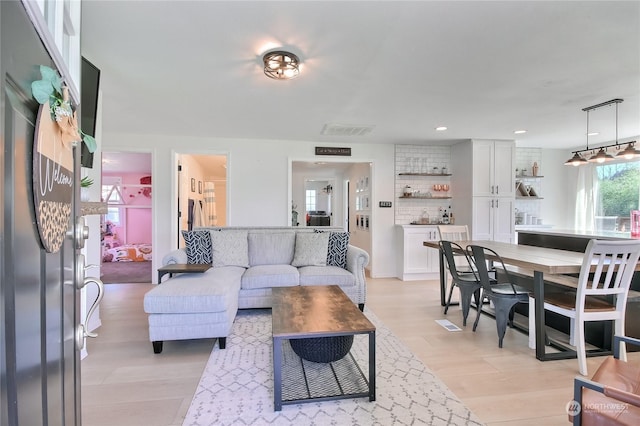 living room featuring light hardwood / wood-style flooring