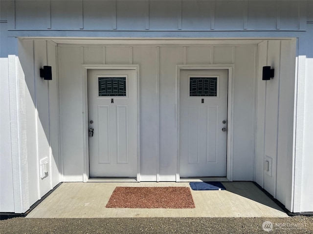 1306 Melbourne Ct, Westport, WA 98595 - view of exterior entry featuring board and batten siding
