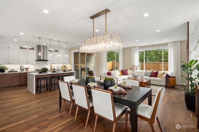 dining room featuring dark wood-type flooring and recessed lighting