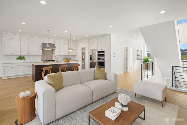 living room with light hardwood / wood-style floors