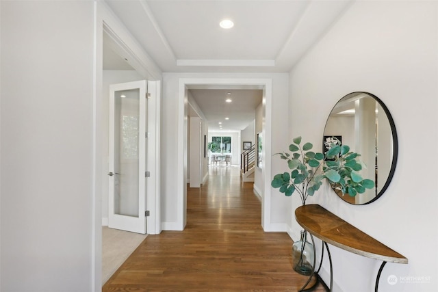 hall featuring wood-type flooring