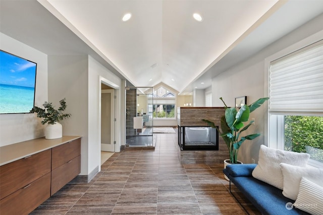 living room with lofted ceiling