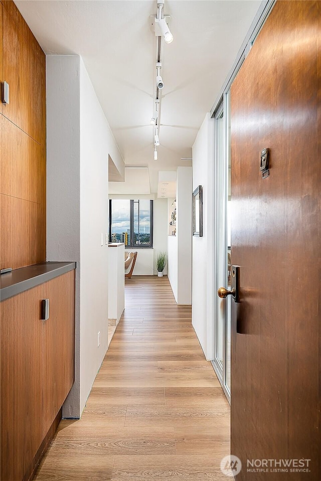 2100 3rd Ave Unit 2503, Seattle, WA 98121 - corridor featuring rail lighting and light wood-style flooring