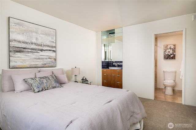 2100 3rd Ave Unit 2503, Seattle, WA 98121 - bedroom featuring carpet flooring and ensuite bathroom