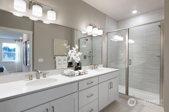 bathroom featuring vanity and walk in shower