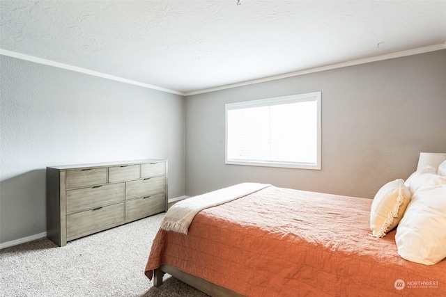 carpeted bedroom featuring crown molding