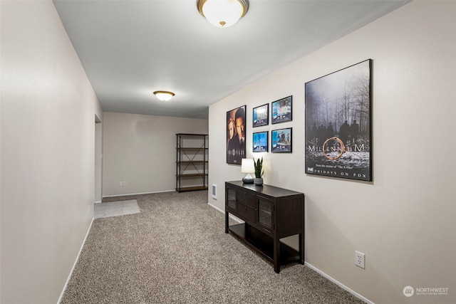 corridor with light carpet