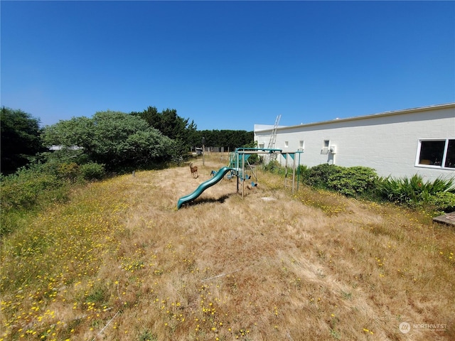 view of yard with a playground