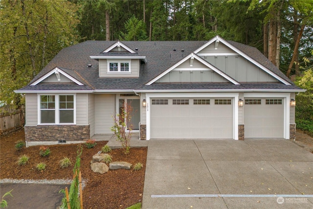 craftsman-style home with a garage