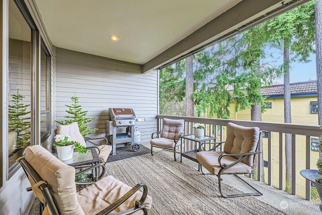 wooden deck featuring grilling area