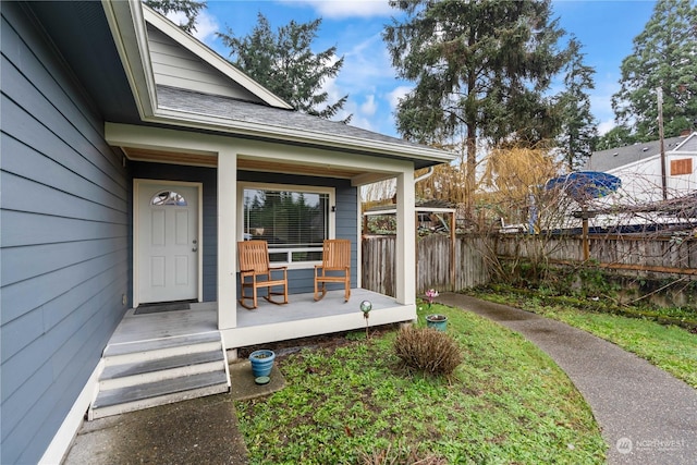 doorway to property with a porch