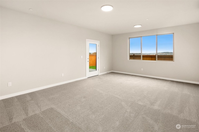 unfurnished room with carpet