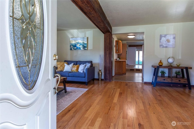 45143 Main St, Concrete, WA 98237 - entryway featuring beam ceiling and wood-type flooring