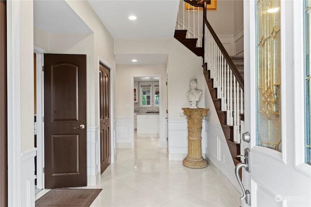 entryway featuring light tile patterned floors