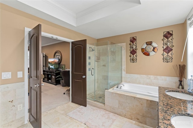 bathroom with tile patterned flooring, vanity, crown molding, and independent shower and bath