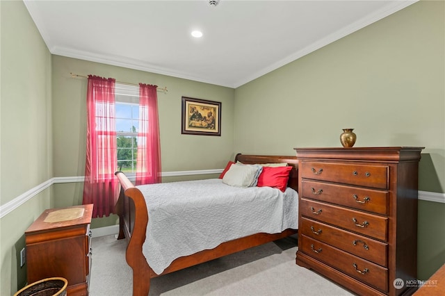 carpeted bedroom featuring ornamental molding