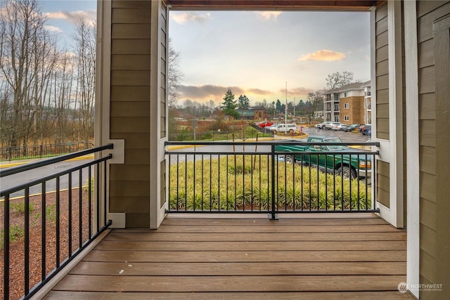 view of balcony at dusk