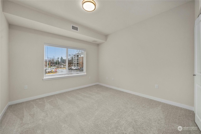 view of carpeted spare room